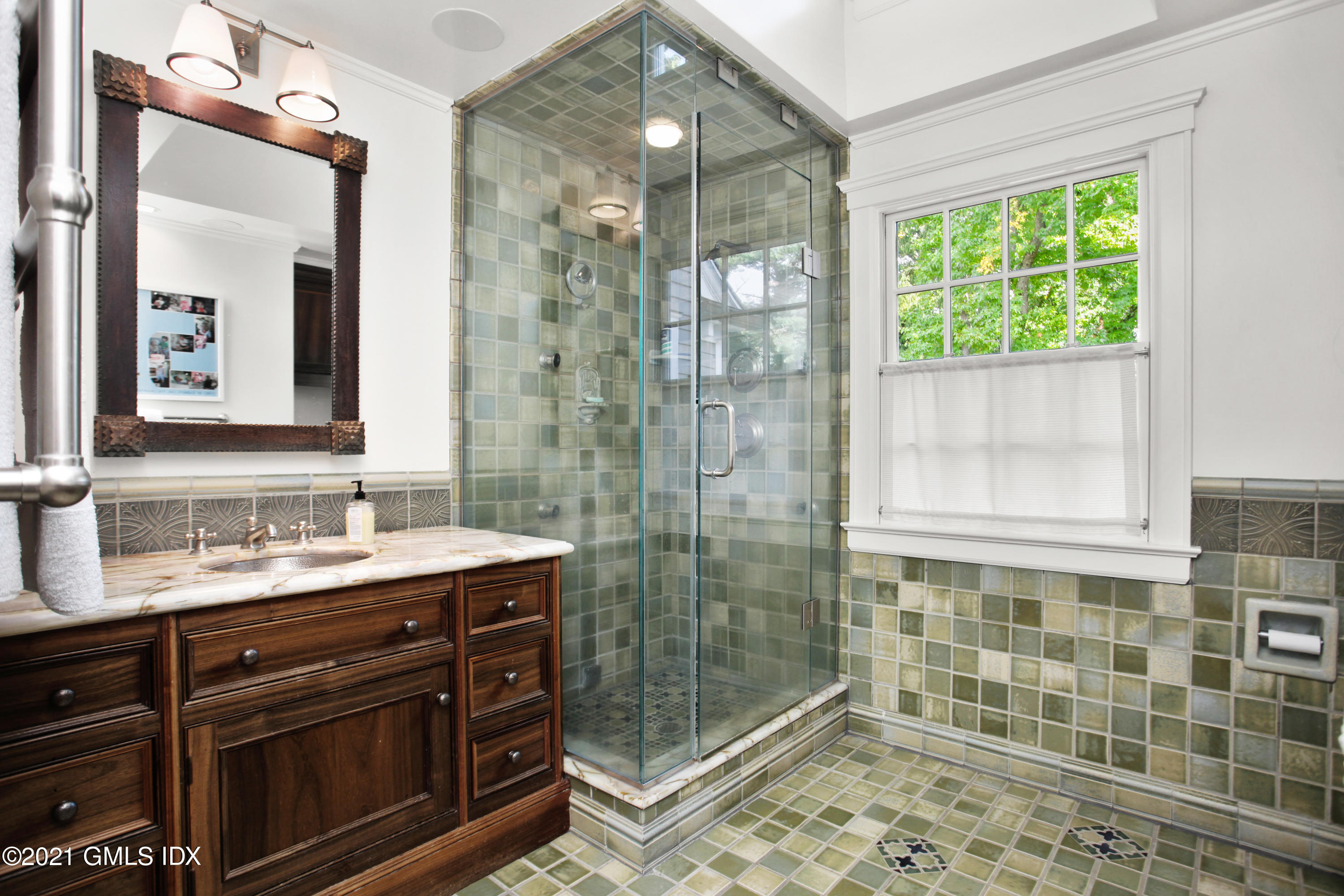 8 Cathlow Drive Riverside, CT 06878 - Photo 29 of 44 a bathroom with a shower sink and mirror