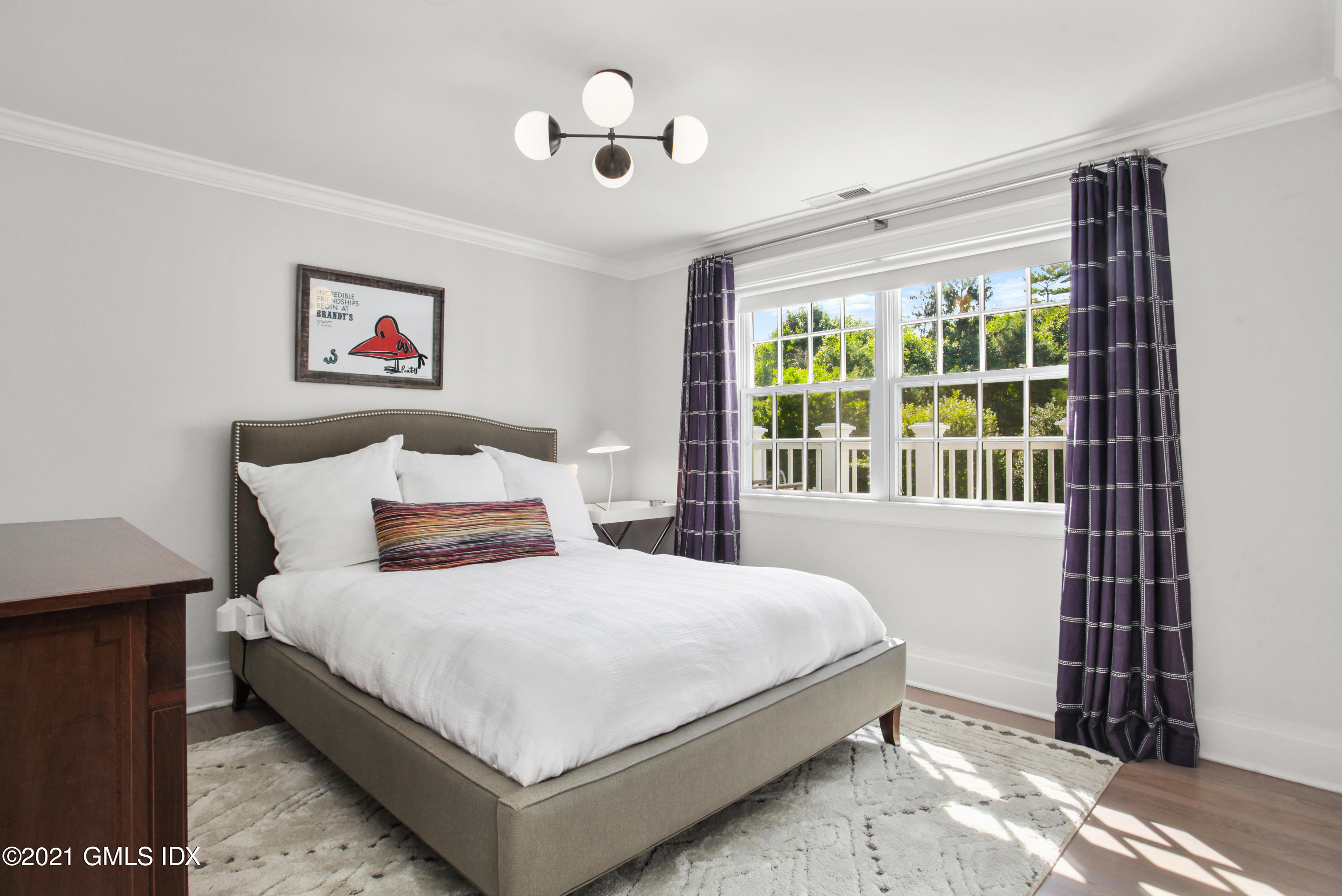 8 Cathlow Drive Riverside, CT 06878 - Photo 32 of 44 a bedroom with a large bed and a window