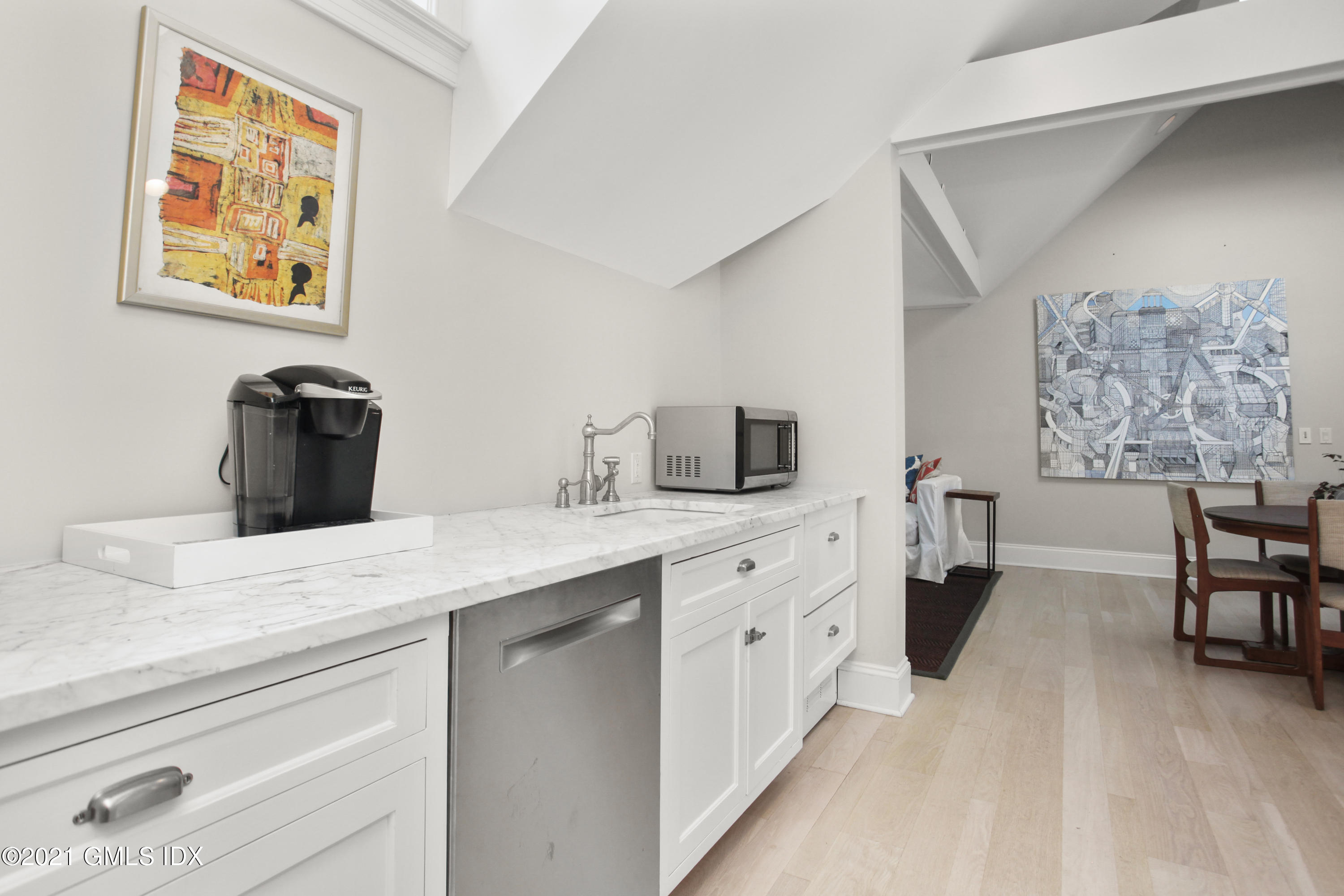 8 Cathlow Drive Riverside, CT 06878 - Photo 36 of 44 a kitchen with stainless steel appliances kitchen island a white cabinets and sink