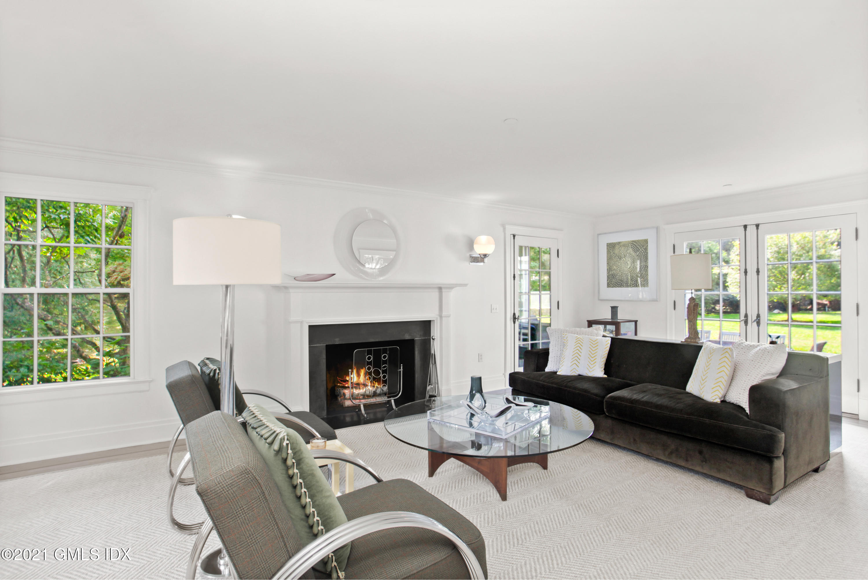 8 Cathlow Drive Riverside, CT 06878 - Photo 8 of 44 a living room with furniture and a fireplace
