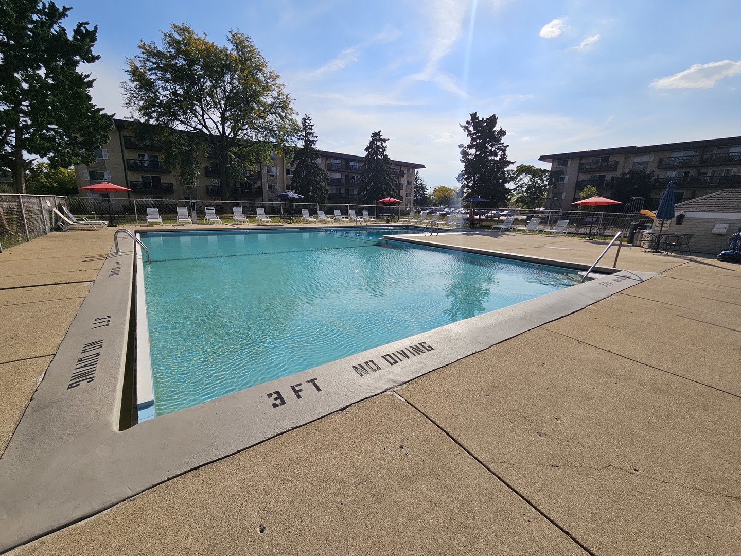 2214 South Goebbert Road, Unit 276 Arlington Heights, IL 60005 - Photo 15 of 17 a view of a swimming pool and outdoor space