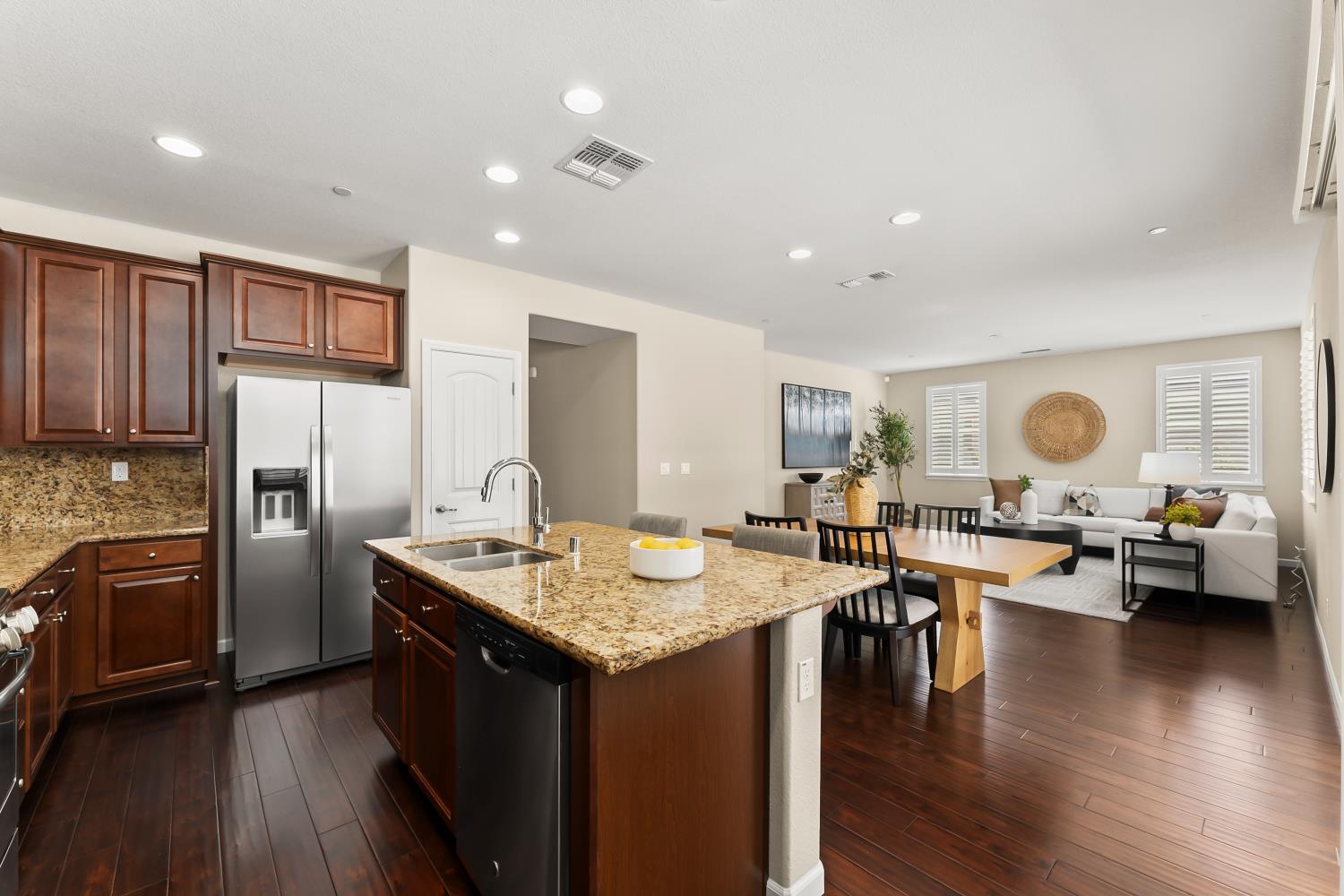 5453 Mossy Stone Way Rancho Cordova, CA 95742 - Photo 20 of 81 a very nice looking kitchen with granite countertop a large counter top space and stainless steel appliances