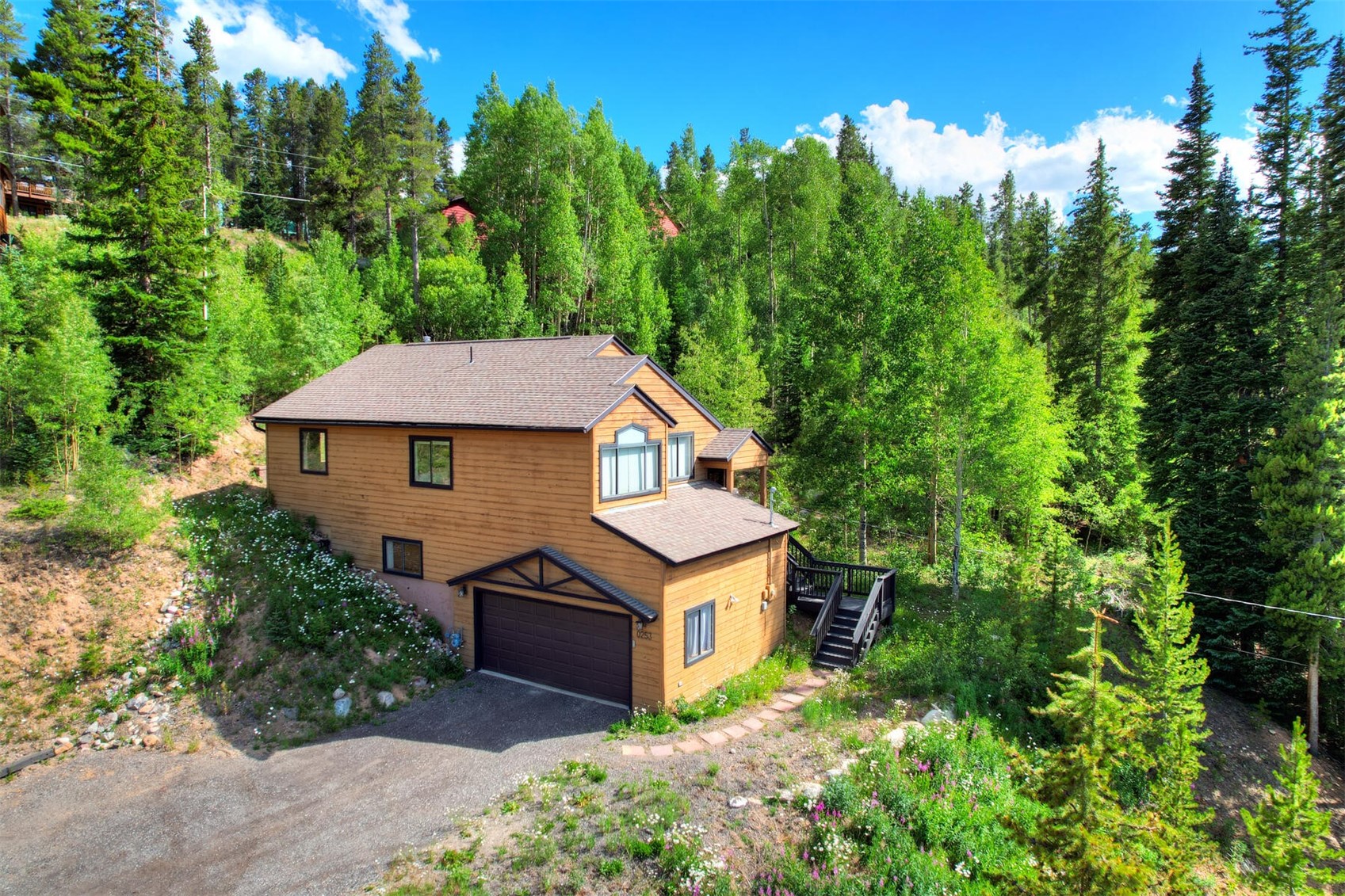 253 Blue Ridge Road Breckenridge, CO 80424 - Photo 2 of 33 View of side of property featuring a garage