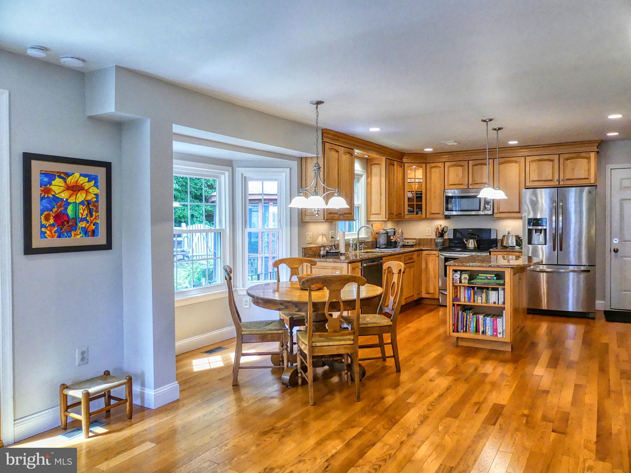 7808 Huntsman Boulevard Springfield, VA 22153 - Photo 22 of 53 Natural light flood the Breakfast Area