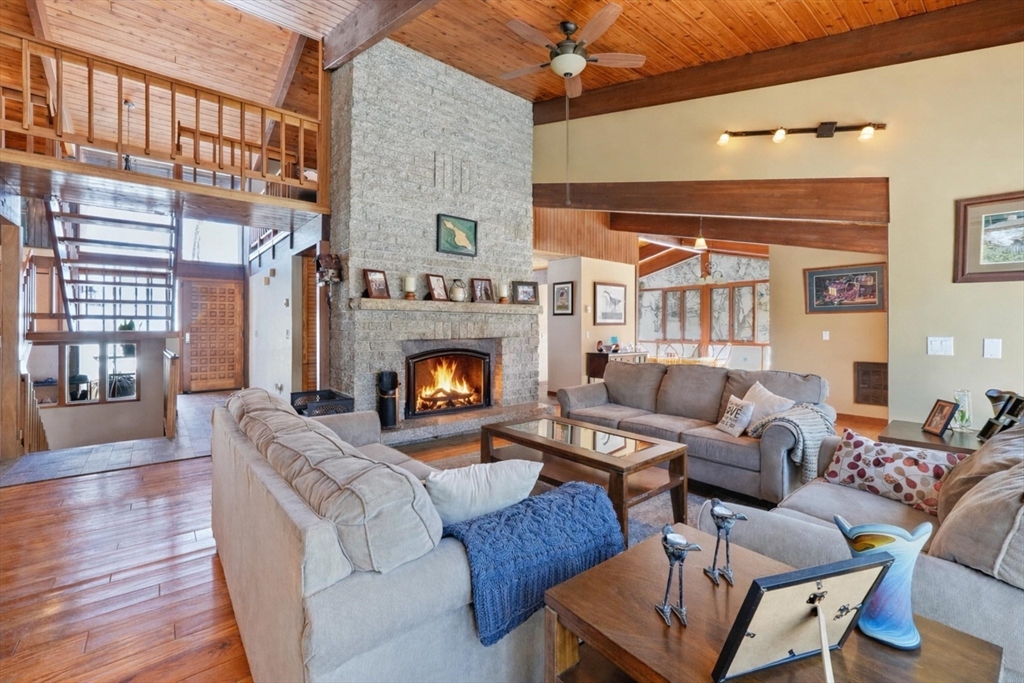 1023 North Woodstock Road Southbridge, MA 01550 - Photo 15 of 41 a living room with furniture and a fireplace