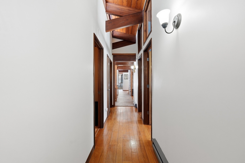 1023 North Woodstock Road Southbridge, MA 01550 - Photo 24 of 41 a view of a hallway with wooden floor