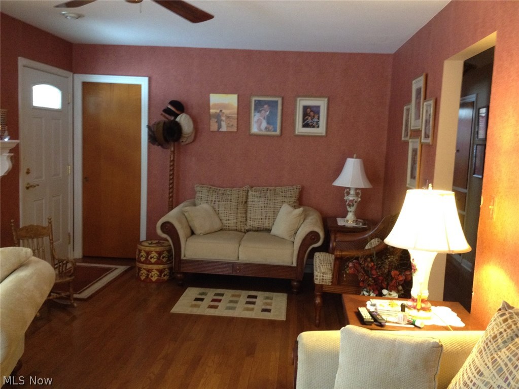 303 Bittersweet Road Akron, OH 44333 - Photo 3 of 20 LIVING ROOM WITH HARDWOOD FLOORING & NEWER ENTRY DOOR.