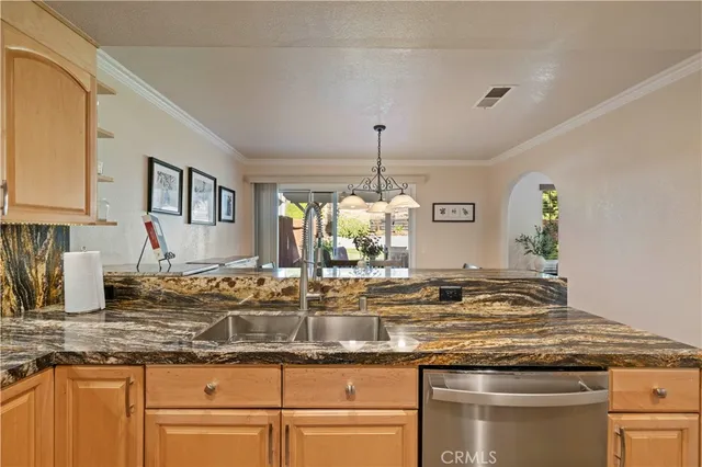 a dining room with a table and chairs