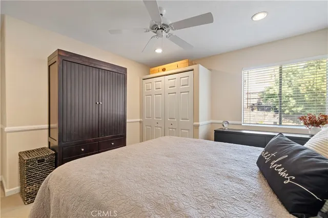 a view of an outdoor dining space with furniture and garden view