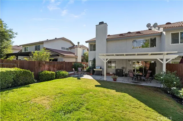 an aerial view of residential house with outdoor space