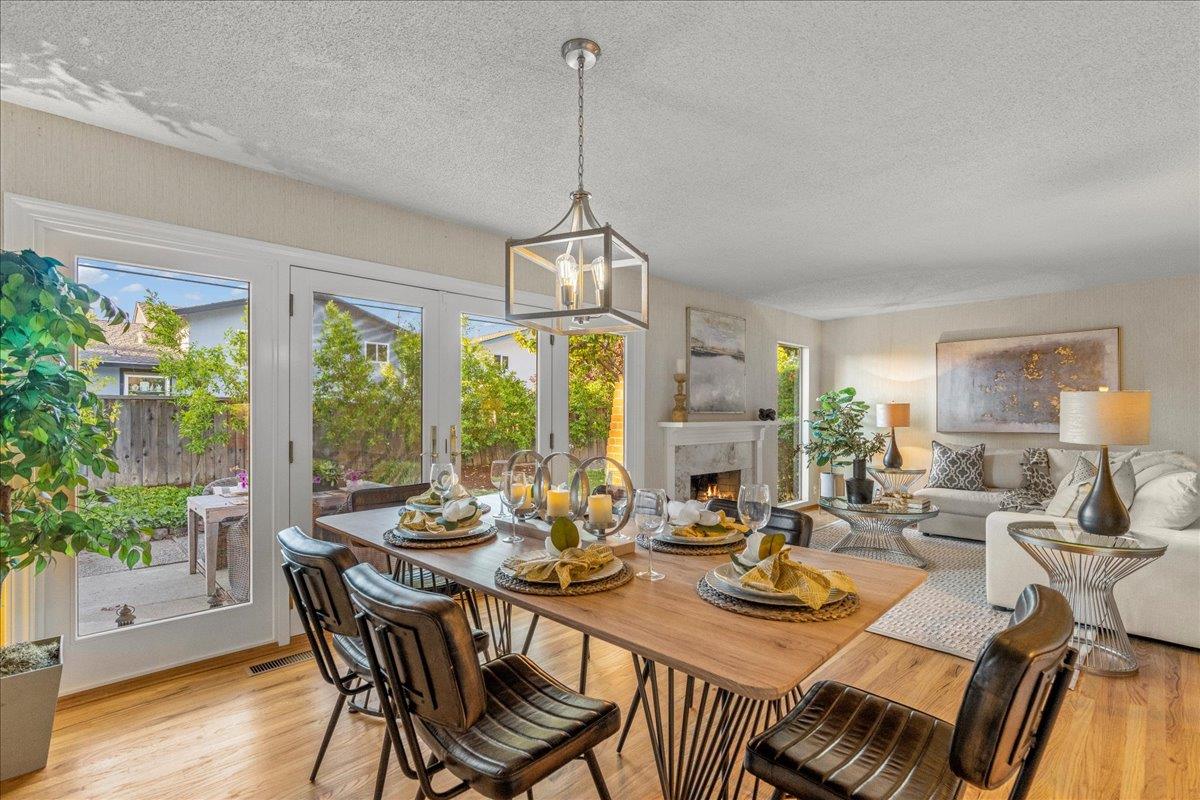 877 West Knickerbocker Drive Sunnyvale, CA 94087 - Photo 15 of 51 a view of a dining room with furniture window and wooden floor