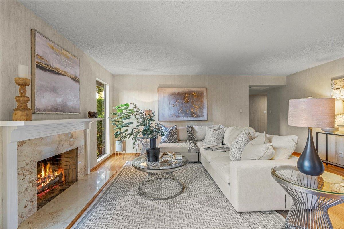 877 West Knickerbocker Drive Sunnyvale, CA 94087 - Photo 18 of 51 a living room with furniture and a fireplace