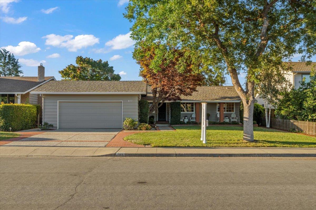 877 West Knickerbocker Drive Sunnyvale, CA 94087 - Photo 2 of 51 a front view of a house with a garden