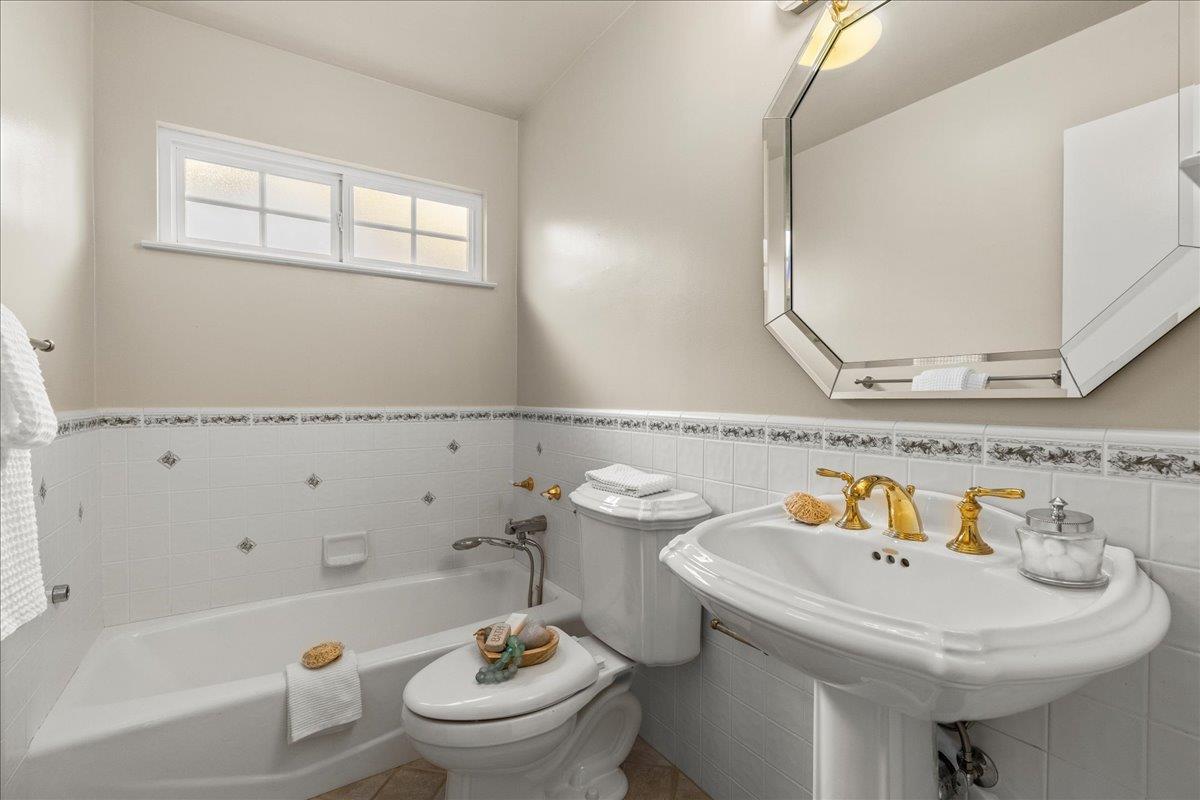 877 West Knickerbocker Drive Sunnyvale, CA 94087 - Photo 23 of 51 a bathroom with a sink and a mirror