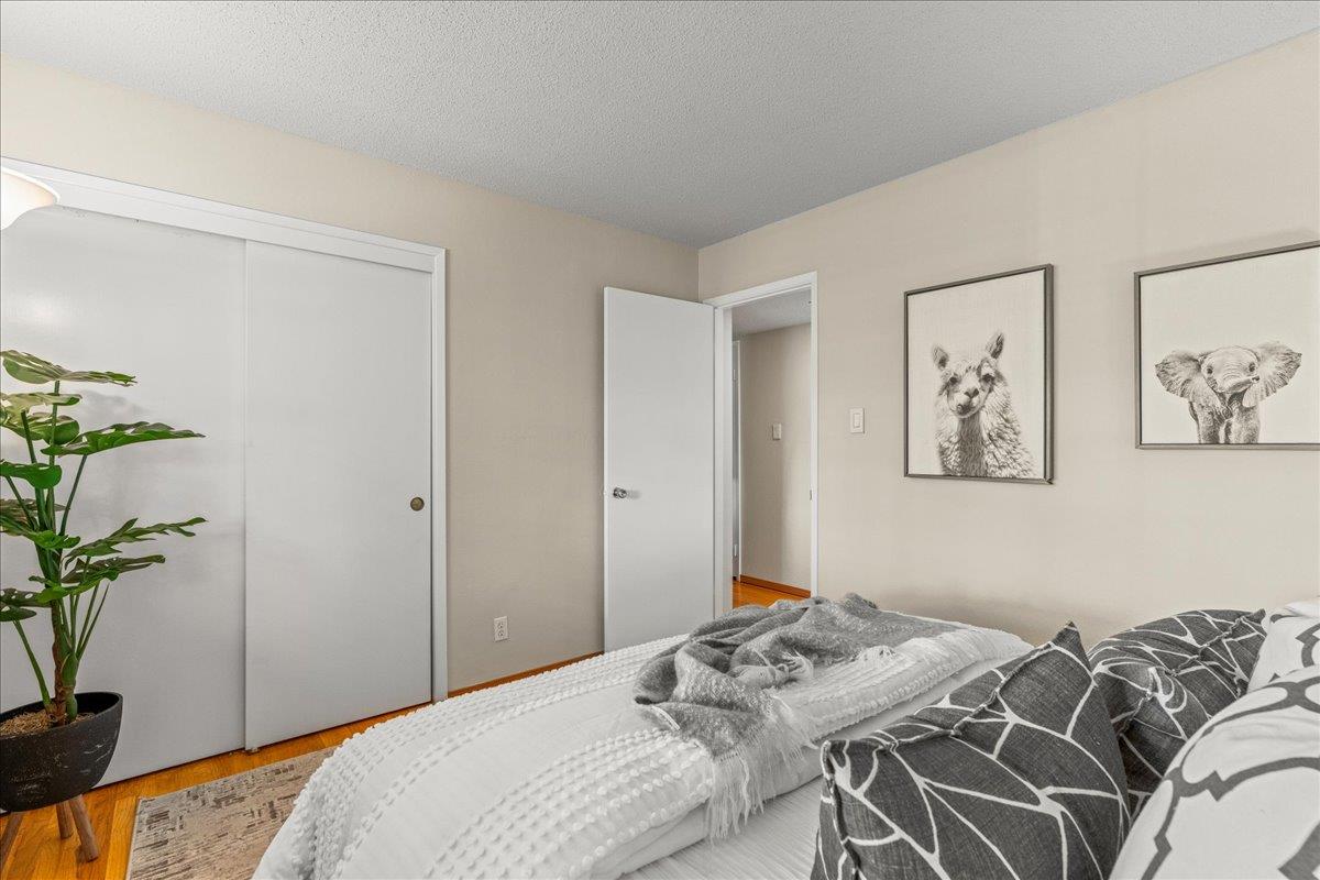 877 West Knickerbocker Drive Sunnyvale, CA 94087 - Photo 27 of 51 a bedroom with a bed and a potted plant