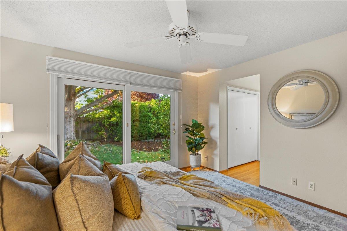 877 West Knickerbocker Drive Sunnyvale, CA 94087 - Photo 29 of 51 a bed room with a bed and a couch