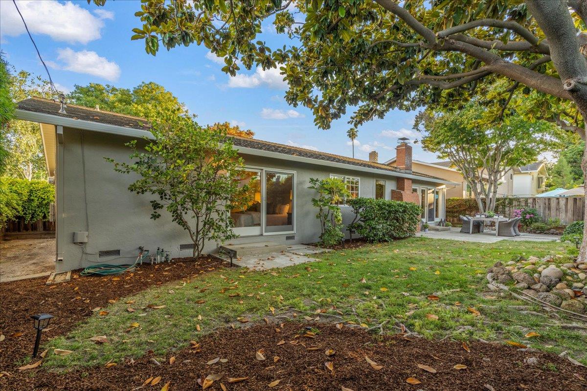 877 West Knickerbocker Drive Sunnyvale, CA 94087 - Photo 38 of 51 a view of a house with backyard and a tree