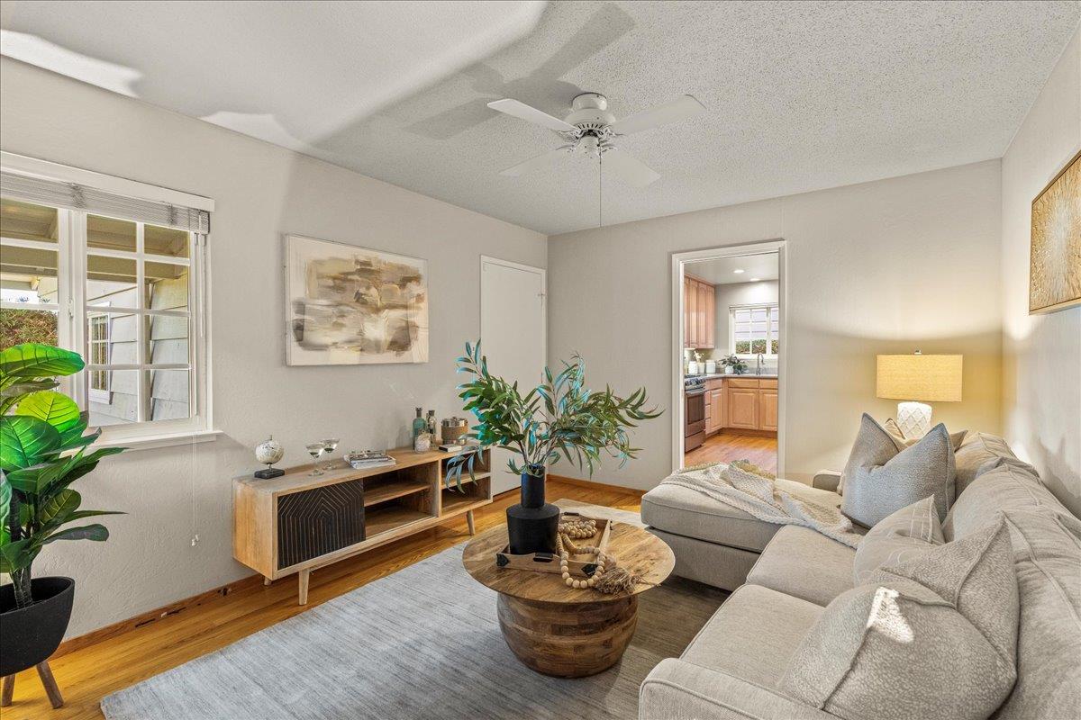 877 West Knickerbocker Drive Sunnyvale, CA 94087 - Photo 7 of 51 a living room with furniture and a potted plant