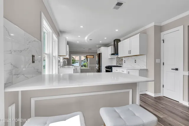 a view of livingroom with furniture wooden floor and window