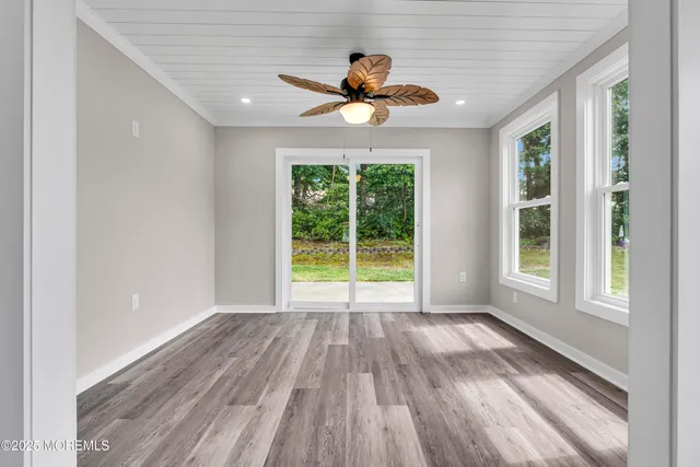 a bathroom with a shower and a toilet