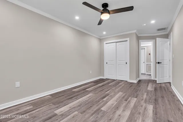 a bathroom with a toilet and shower