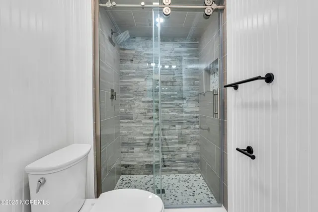 a view of a park with a tree