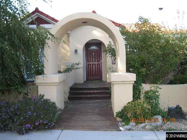 825 La Rue Avenue Reno, NV 89509 - Photo 1 of 13 a front view of a house with a garden