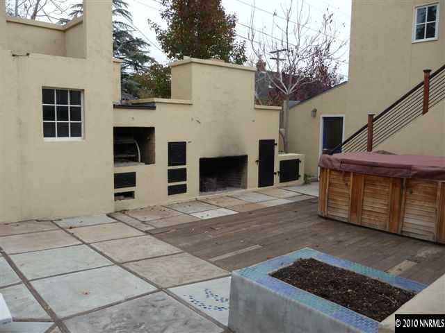 825 La Rue Avenue Reno, NV 89509 - Photo 12 of 13 a house with trees in front of it