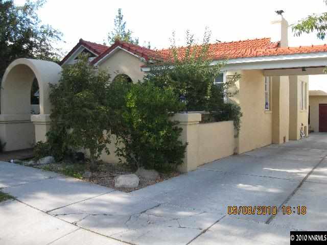 825 La Rue Avenue Reno, NV 89509 - Photo 2 of 13 a view of a house with a yard