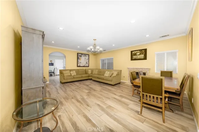 a view of a livingroom with furniture and a fireplace
