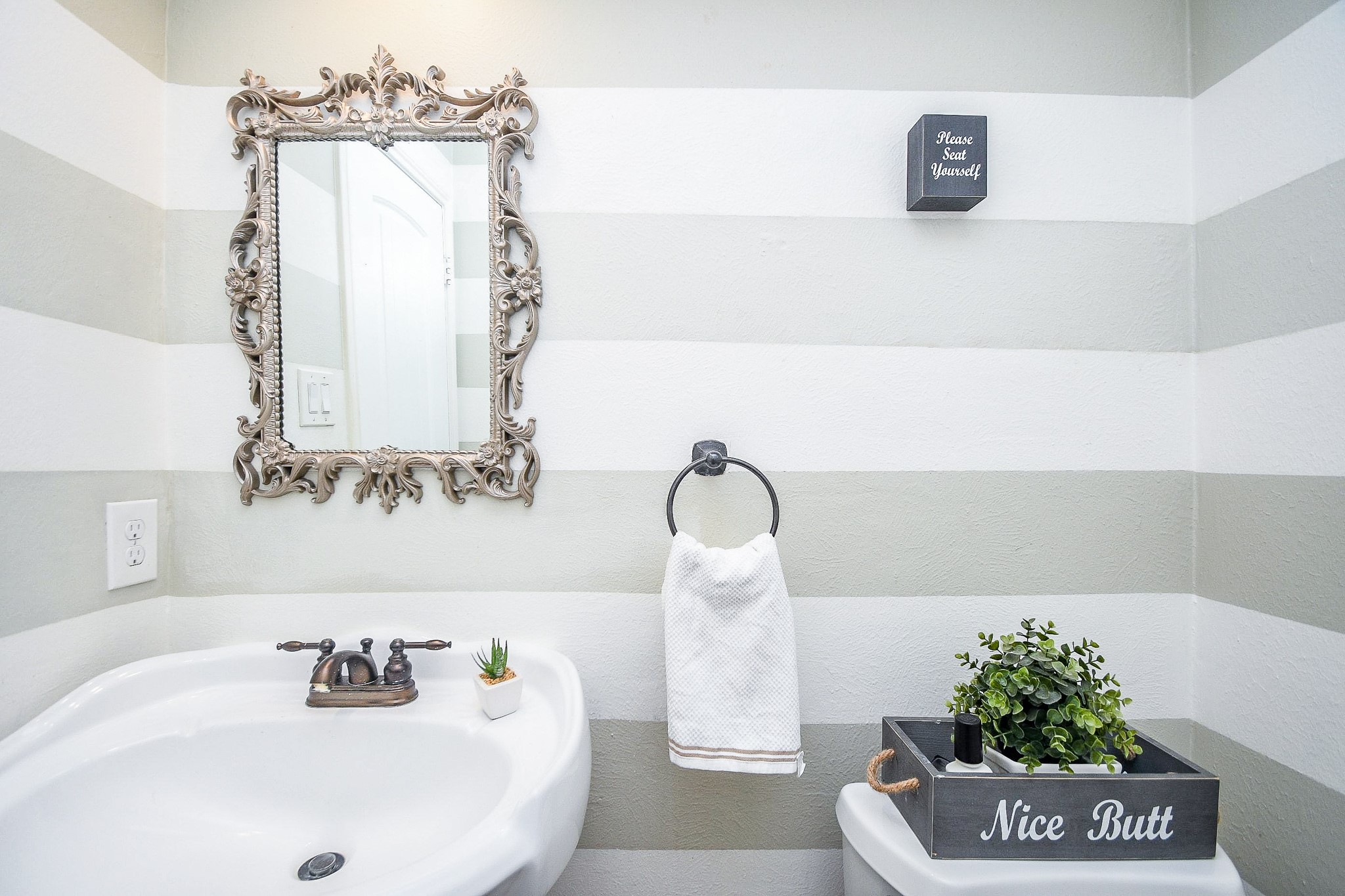 14686 Perthshire Road, Unit H Houston, TX 77079 - Photo 18 of 22 a bathroom with a sink and a mirror