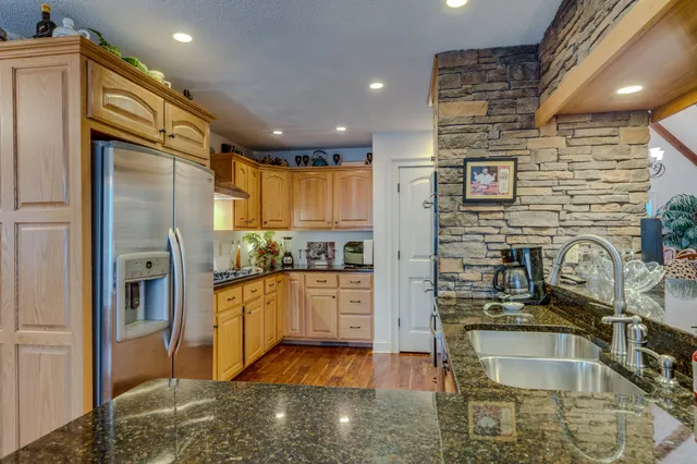 a bedroom with double bed and a window