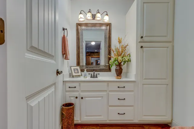 a spacious bedroom with a bed and a large window