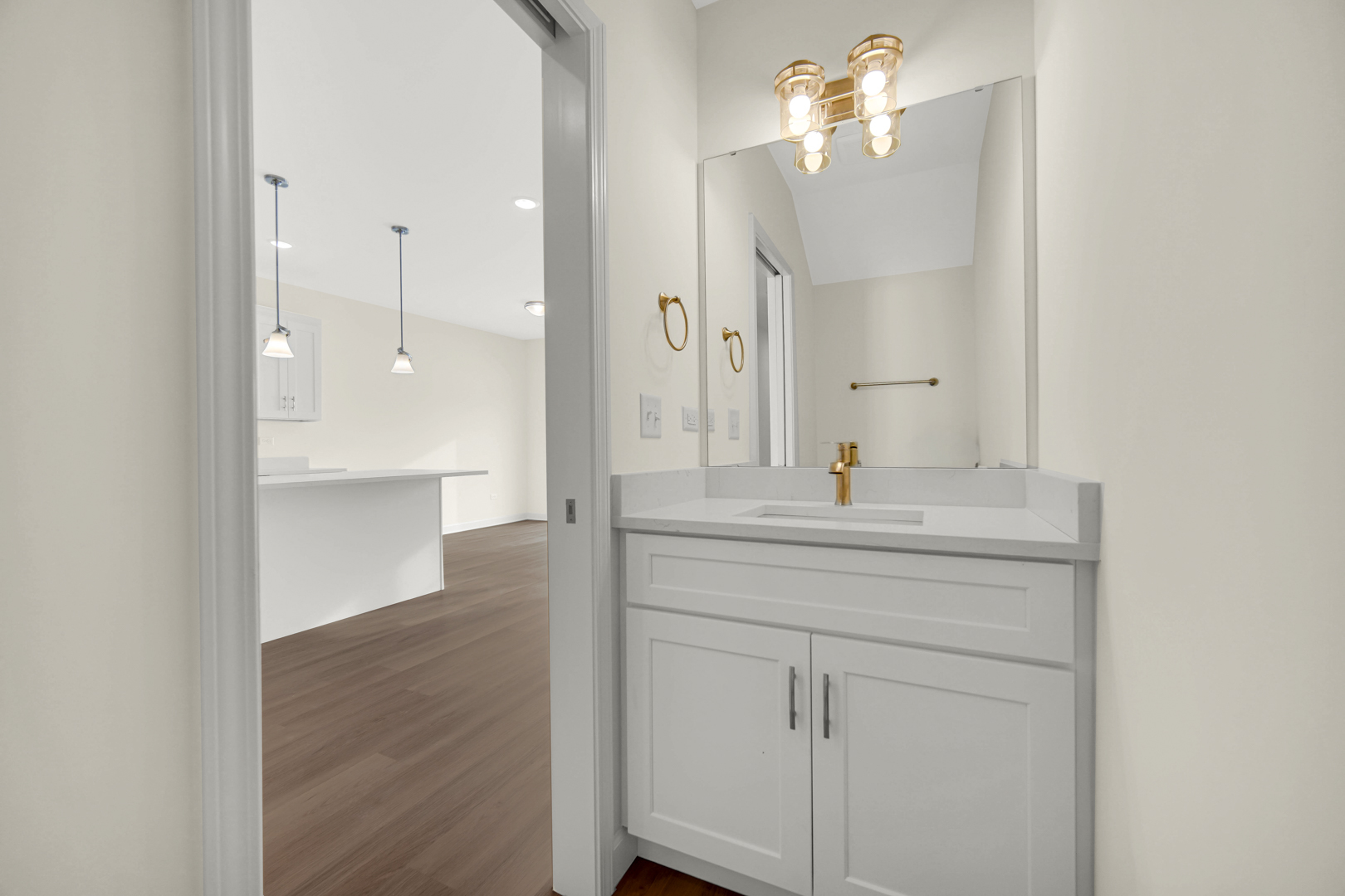 5404 135th Street Crestwood, IL 60418 - Photo 12 of 23 a bathroom with a sink a mirror and a shower