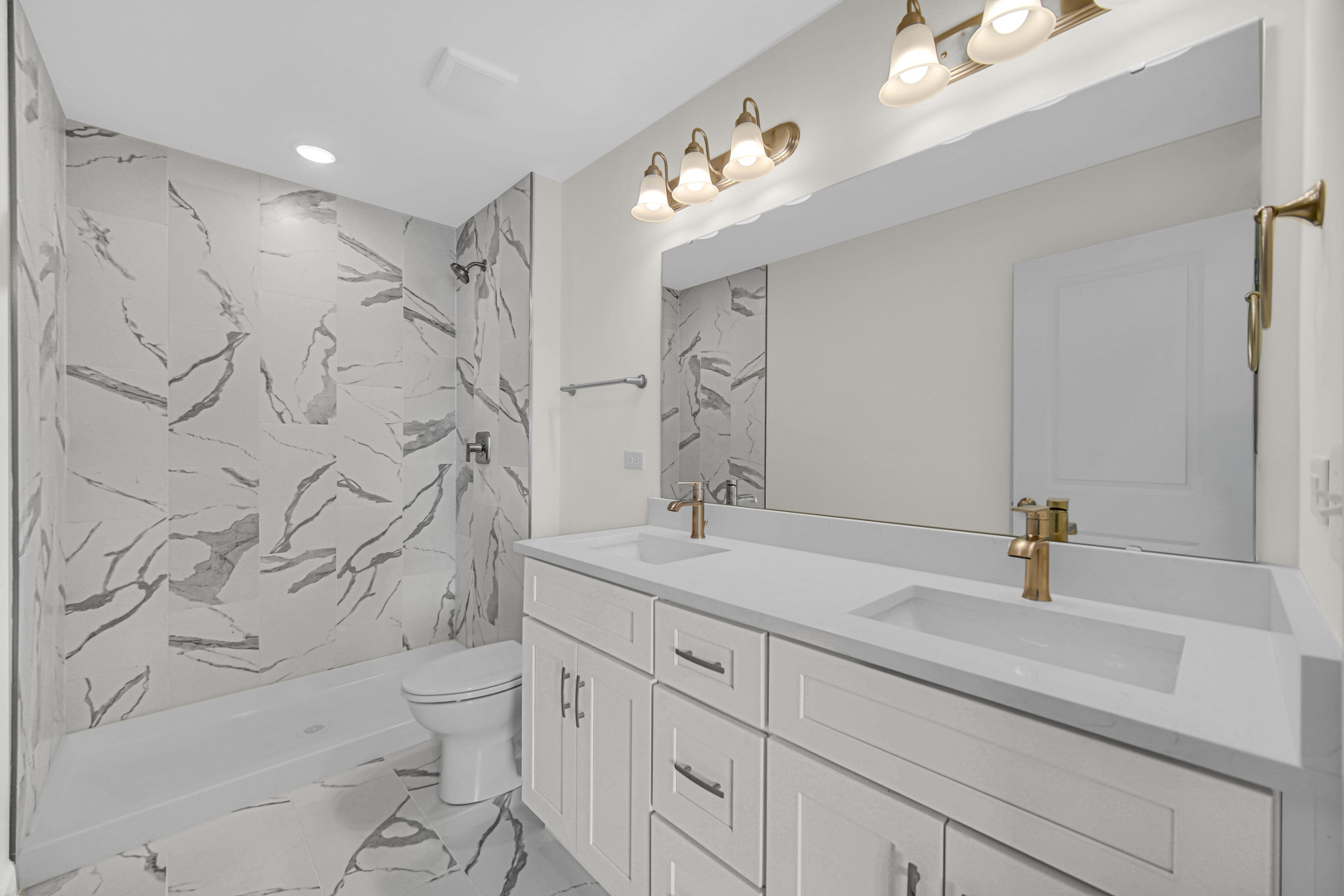 5404 135th Street Crestwood, IL 60418 - Photo 14 of 23 a bathroom with a sink a toilet and shower