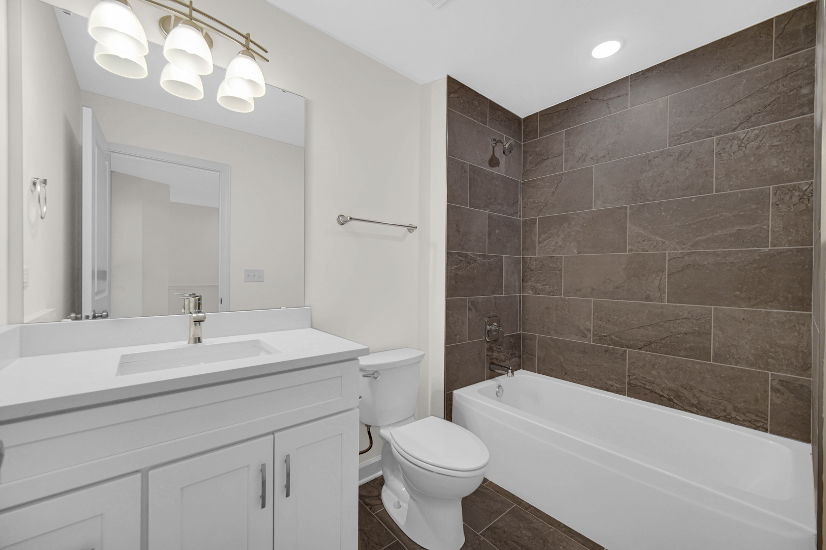 5404 135th Street Crestwood, IL 60418 - Photo 18 of 23 a bathroom with a sink a toilet and bathtub