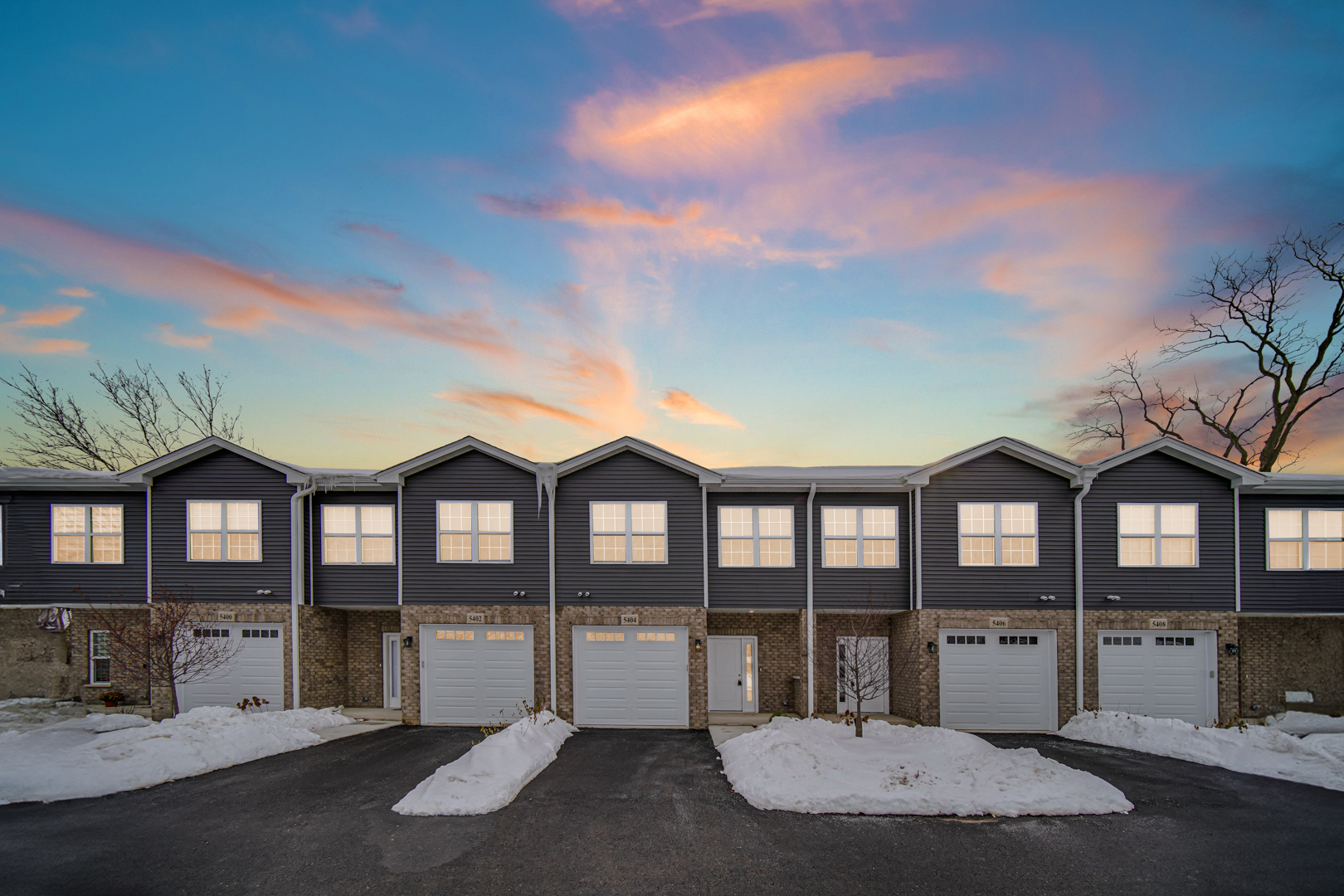 5404 135th Street Crestwood, IL 60418 - Photo 2 of 23 a view of a large building with a swimming pool and porch
