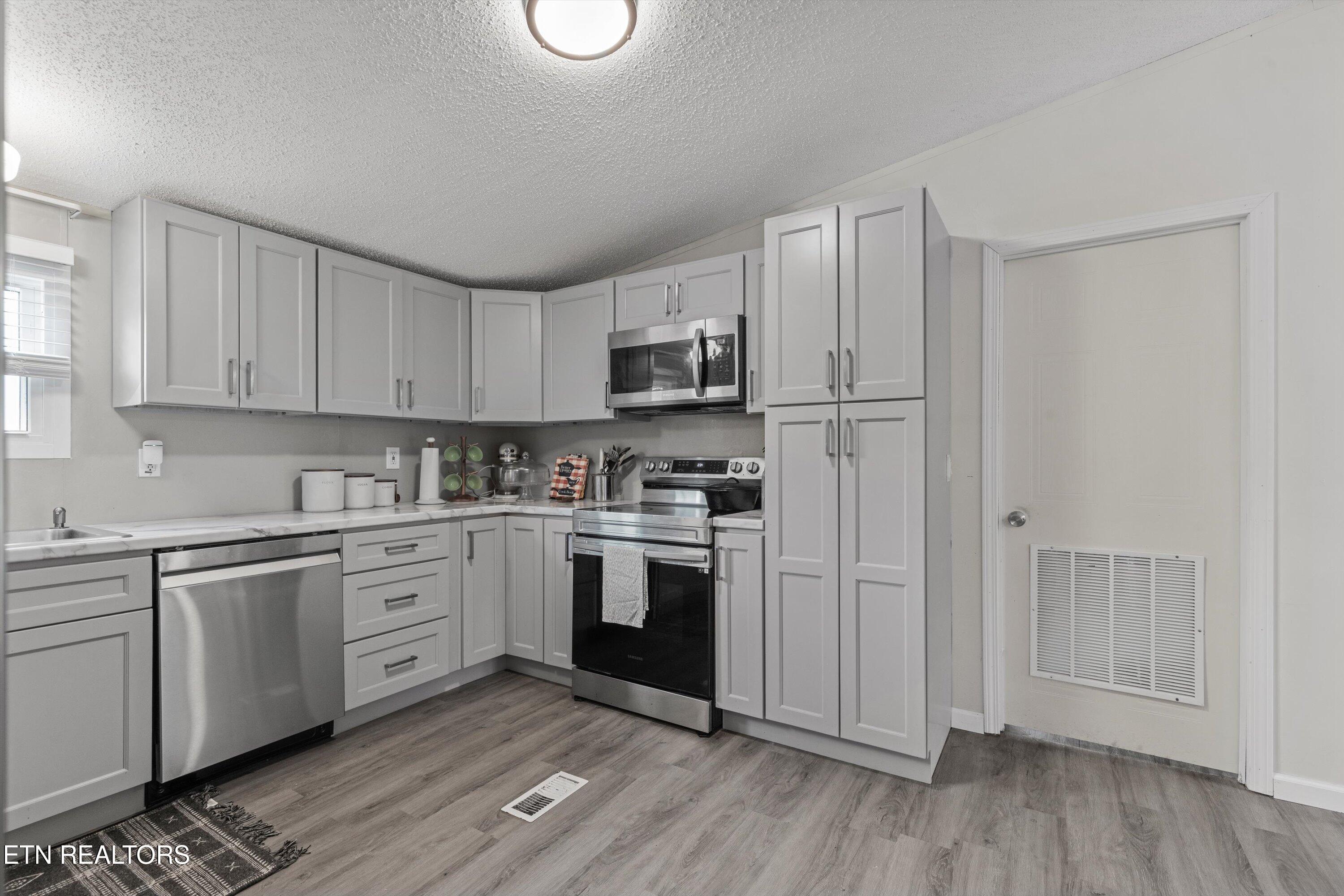 928 Walker Road Maryville, TN 37801 - Photo 11 of 33 Kitchen and Laundry Door