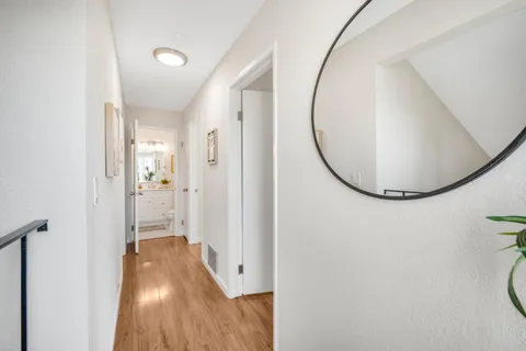 a view of a livingroom from a hallway