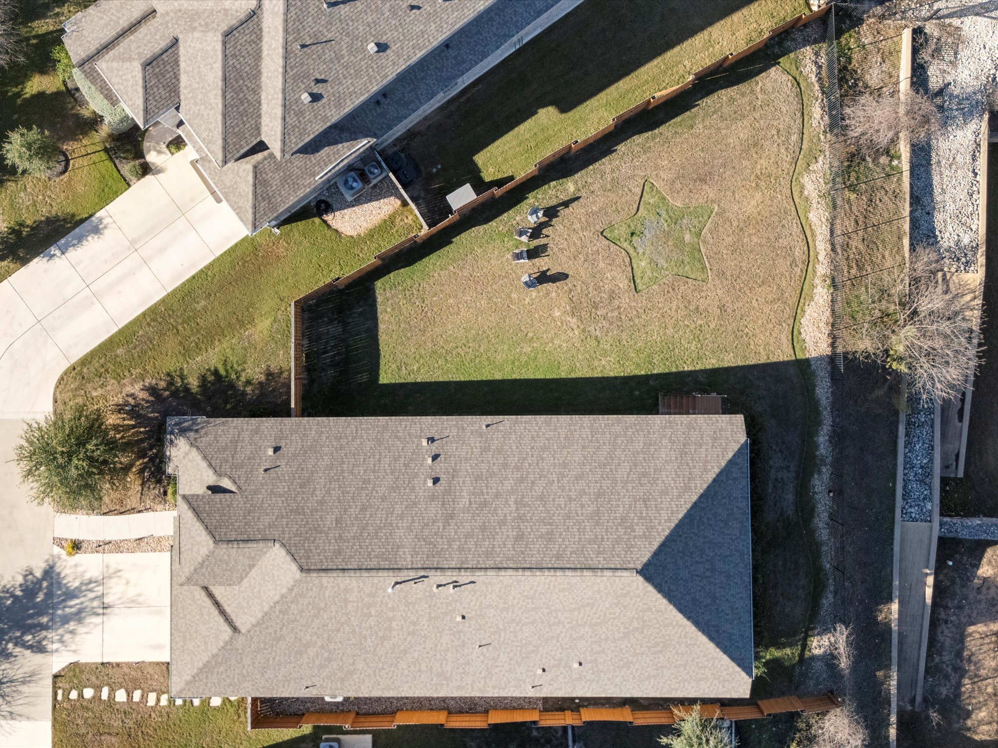 1009 Deer Rim Road Leander, TX 78641 - Photo 34 of 40 Aerial view from above. Just a few houses from the amenity center, you’ll have easy access to the fitness facility and community pool, with a greenbelt trail right behind the property.