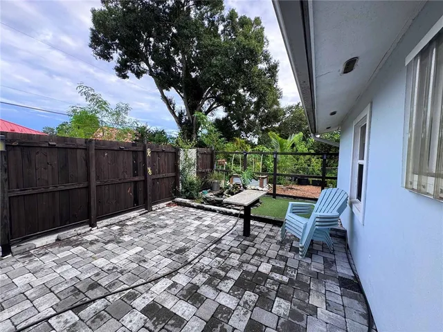 a view of a bench in a backyard