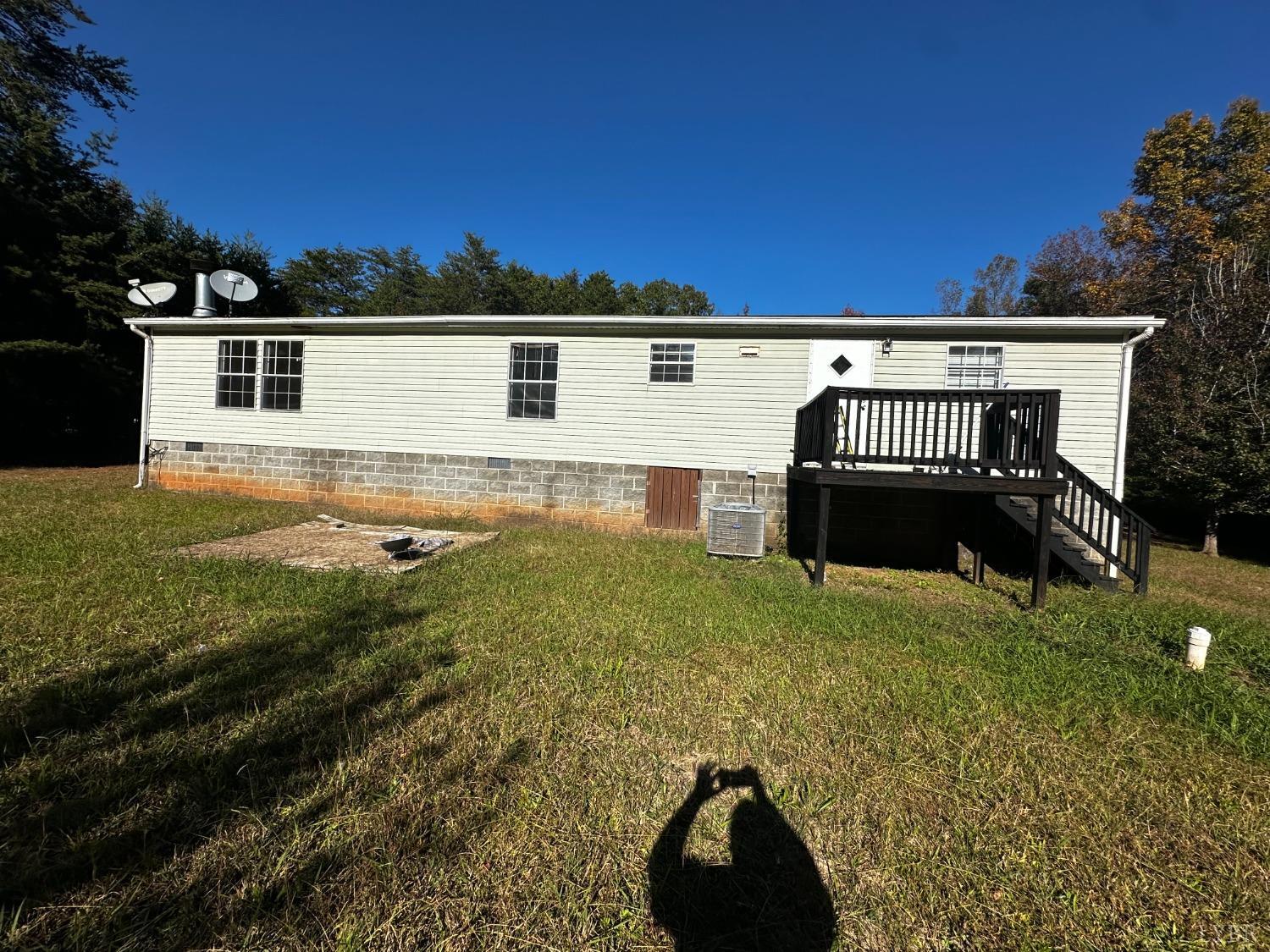 2031 Virso Road Meherrin, VA 23954 - Photo 25 of 29 a view of a backyard with a sink and outdoor seating