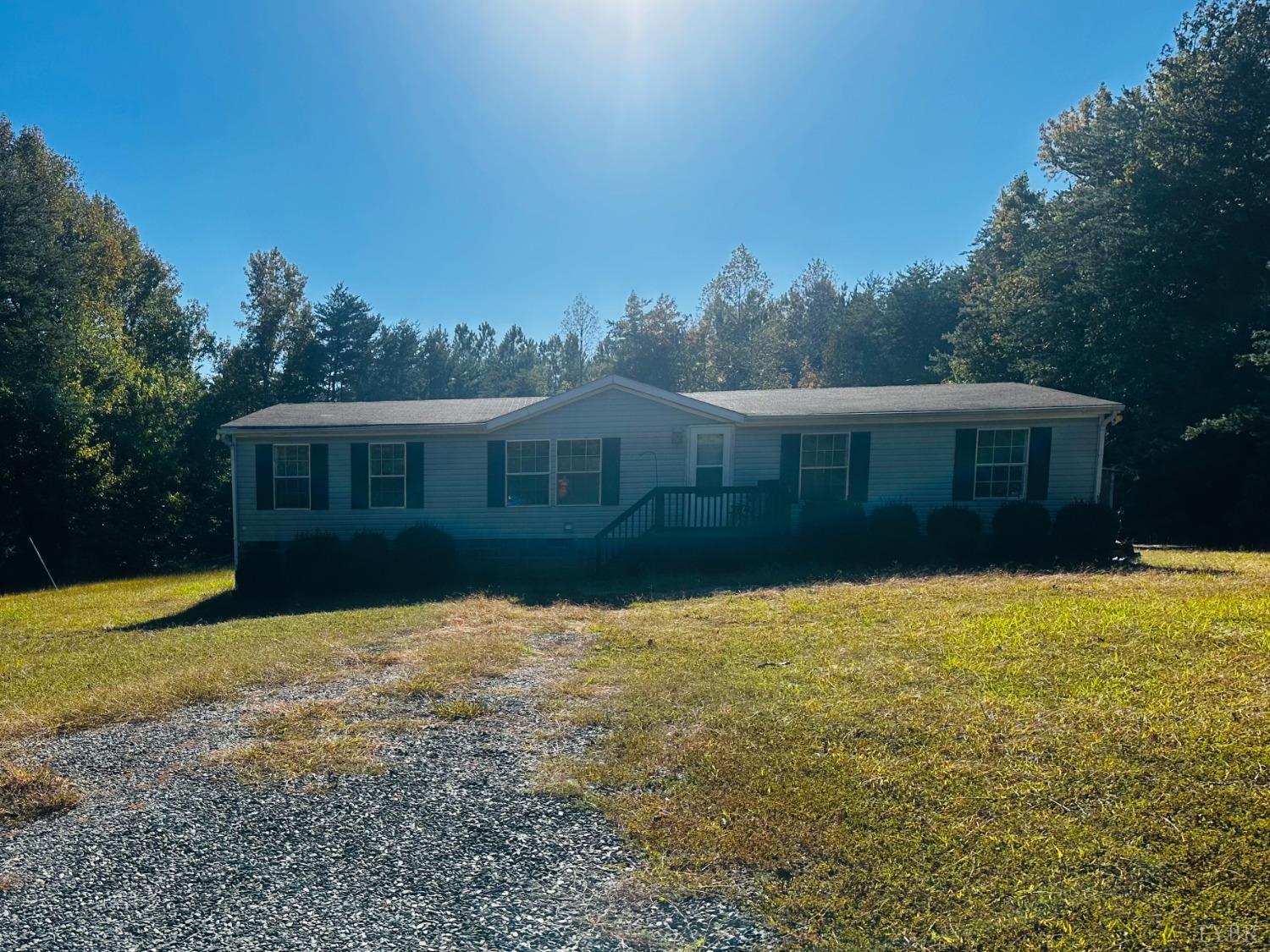 2031 Virso Road Meherrin, VA 23954 - Photo 3 of 29 a front view of a house with a yard