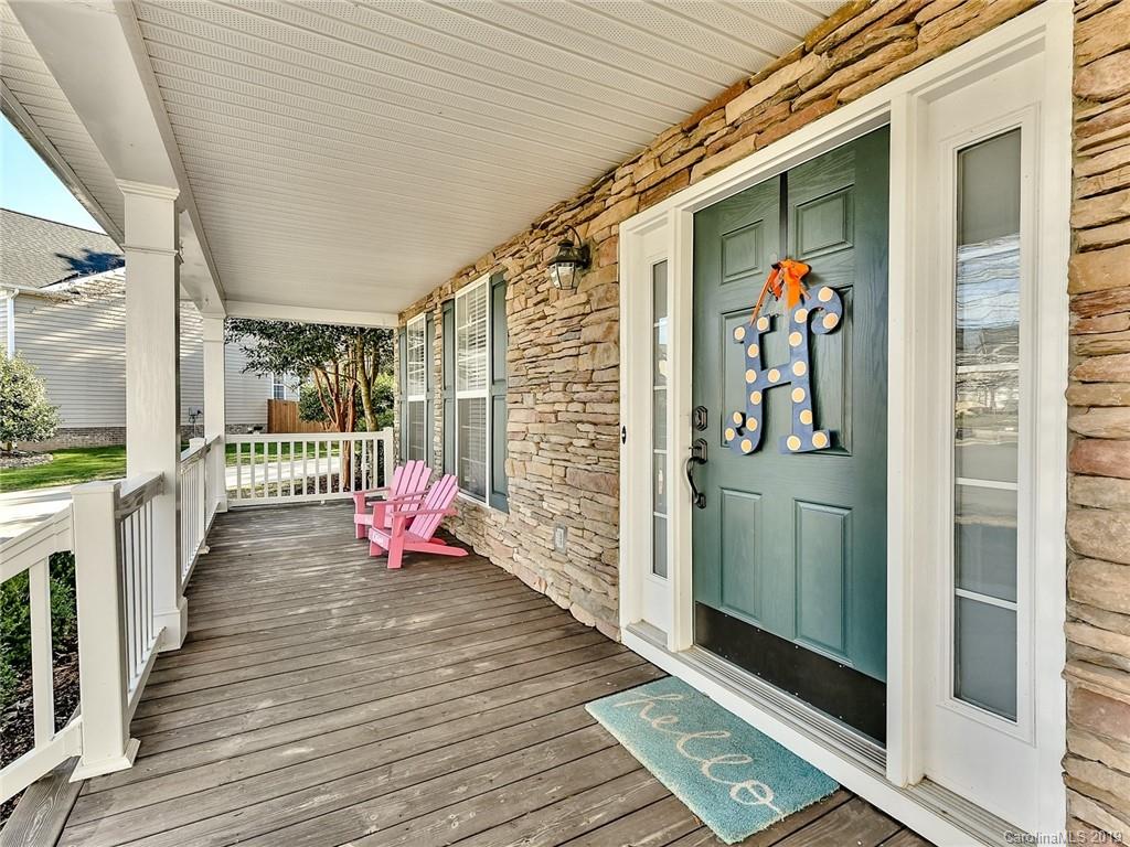 4723 Lapis Court Fort Mill, SC 29708 - Photo 2 of 36 a porch with wooden floor