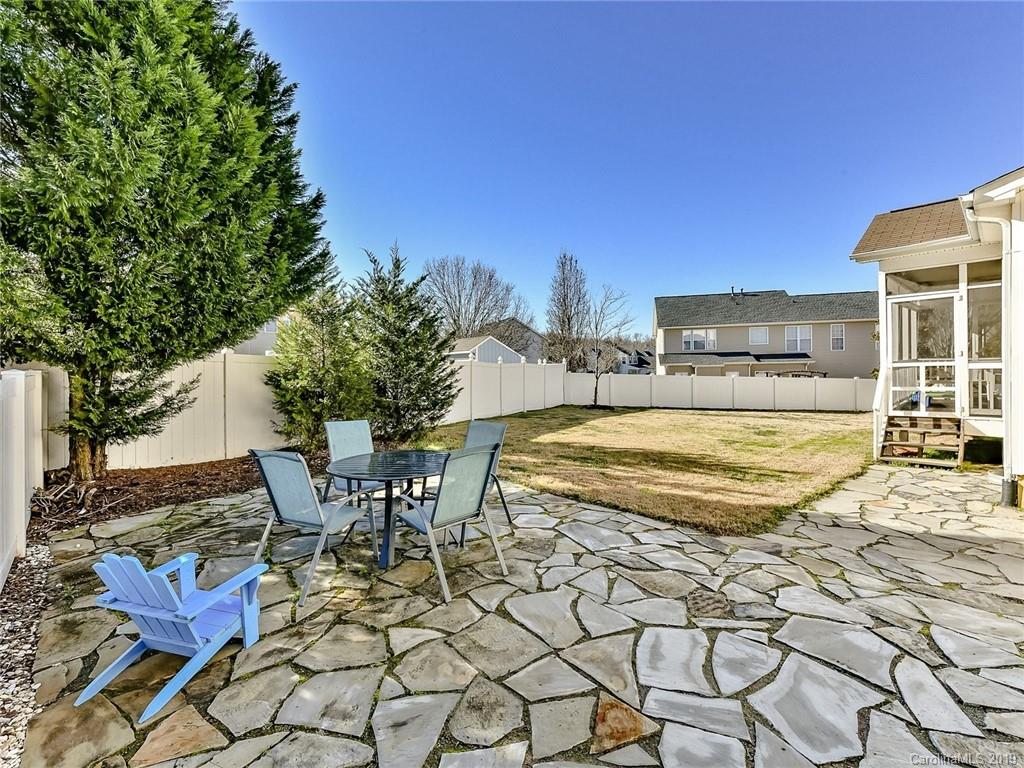 4723 Lapis Court Fort Mill, SC 29708 - Photo 30 of 36 a view of a swimming pool with outdoor seating