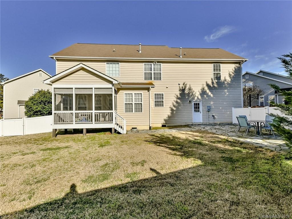 4723 Lapis Court Fort Mill, SC 29708 - Photo 32 of 36 a front view of a house with a yard