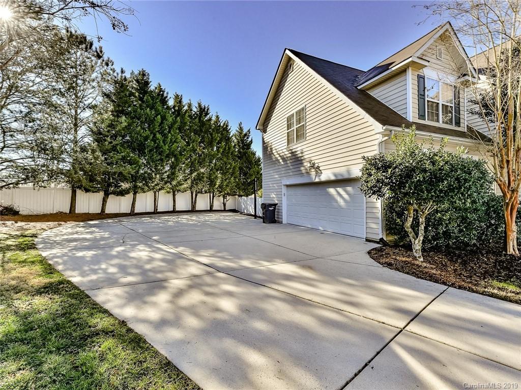 4723 Lapis Court Fort Mill, SC 29708 - Photo 33 of 36 a view of a house with a yard