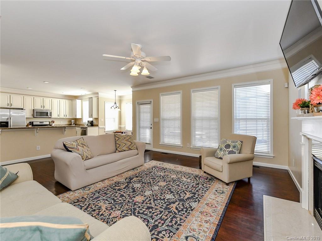 4723 Lapis Court Fort Mill, SC 29708 - Photo 8 of 36 a living room with furniture and a large window