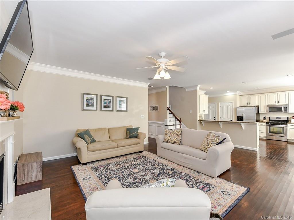 4723 Lapis Court Fort Mill, SC 29708 - Photo 9 of 36 a living room with furniture and wooden floor