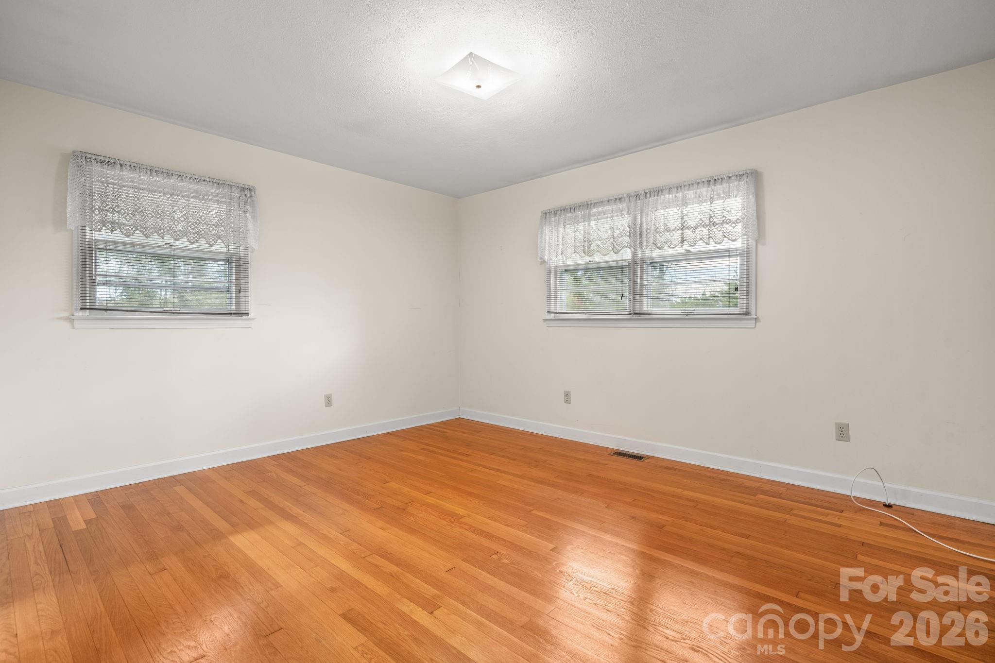 1200 Piedmont Road Morganton, NC 28655 - Photo 11 of 27 a view of an empty room with a window